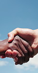 Hands, friends outdoor or handshake for fitness progress, teamwork and partnership celebration. People, fist bump greeting or respect in city for exercise support, workout goals and bonding together.