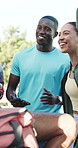 Conversation, fitness and group of people outdoor for workout, training or wellness together. Happy, talking and huddle of athletes with cardio exercise, sports or health in nature in morning.