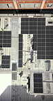 Drone, architecture and people on building, solar panels or property development with sustainability. Outdoor, group and colleagues with renewable energy, aerial view and civil engineering in city