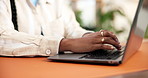 Hands, woman and florist typing on laptop for inventory update, sales or review. Computer, plant shop and person in small business to order stock, floral decoration and research online in nursery