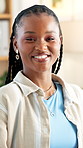 Face, creative and black woman with smile in office for career pride, about us and publication agency. Portrait, female journalist and ambition for news reporting, job development and copywriting
