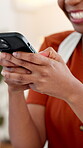 Woman, hands and laughing in office with phone for text message, online meme and conversation. Black person, typing and smile in workplace with tech for mobile app, funny chat and social media joke.