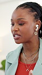 Video call, discussion or black woman in office with earphones, networking or feedback in client chat. Digital, talk or consultant in agency with tech, online meeting or report update for stakeholder