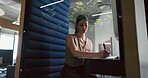 Business, woman and writing in office pod for story planning, editor feedback and creative process. Hybrid work, journalist or notes in cubicle for publication draft, fact checking submission or info