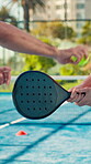 Hands, padel racket or serving on court, sports training or technique development for improvement. Outdoor practice,  tennis guidance or people hit ball with gear for accuracy drill, swing or fitness