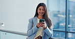 Happy, phone and business woman in office for social media, networking and website news. Professional, corporate and person on smartphone for internet, online notification and typing message in lobby