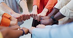 Business people, hands and meeting with fist bump in huddle for mission, trust or inclusion. Group, employees or team with diversity, circle or commitment in unity, support or solidarity for synergy