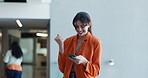 Happy woman, winning and surprise with phone in office for internship acceptance or good news. Excited, female person or junior intern dancing with smile, mobile smartphone or fist pump for success