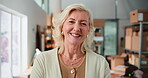 Mature woman, face and logistics with boxes for inventory, storage or supply chain distribution at warehouse. Portrait, person and ecommerce with smile for small business startup or freight service