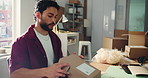 Packing, delivery and man in office with box for ecommerce order with small business card. Parcel, distribution and person with cardboard package for cargo, supply chain or logistics in workplace.