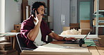 Laptop, logistics and phone call with business man at desk in office for delivery or shipping update. Computer, conversation and explain with employee in supply chain workplace for distribution