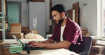 Laptop, thinking and businessman in office with boxes for checking online order for confirmation. Technology, ideas and male logistics manager with computer for email on distribution information.