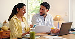 Couple, talk and document with laptop at house for finance planning, review budget and bills invoice. People, paperwork and application for home insurance, mortgage expenses and reminder for payment