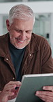 Mature man, tablet and happy at startup, scroll and review with project management at media company. Person, writer and editor with tech, application and smile with feedback at creative agency