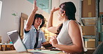 Business people, laptop and high five with boxes for logistics, shipping or supply chain in store. Businessman, woman or colleagues with smile, computer or cargo for distribution or delivery success