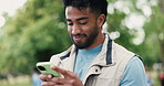Park, volunteer or man typing with phone for social media post, green action or eco outreach promotion. Pride, community service or waste management for environmental change, internet update or tech