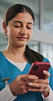 Nurse, woman and typing with phone in clinic for healthcare update, telehealth and patient chat. Medical professional, person and smartphone in hospital for results feedback, email and online contact