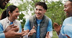 Volunteer, people or applause in park for community service, green project or conservation success. High five, positive impact or team clap for celebration, ngo or nature protection in trash cleaning