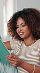 Tablet, smile and woman in home for reading news, blog or online communication. Technology, relax and happy African person on sofa, download app or scroll website for networking on social media