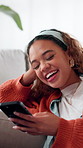 Relax, happy and woman on sofa with phone for social media, online message and funny chat. Home, living room and person on smartphone laughing for internet joke, website and dating app on weekend