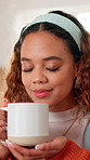 Woman, relax and smell coffee at house to start day, enjoy aroma and calm morning with espresso. Female person, breath and warm beverage for caffeine scent, nostalgia memory with herbal tea in lounge