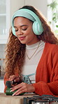 Cooking, woman or meal prep with headphones in kitchen for music playlist, salad recipe or lunch. Dancing, happy girl or cut vegetables in home for healthy brunch, nutrition food or fresh ingredients