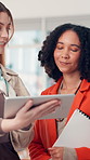 Creative, research and women with tablet, office and collaboration for project with info on website. Reporter, manager and feedback for woman, proofreading and colleagues with article in newsroom