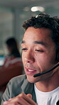 Call center, night or man in office with headset, contact us or communication in customer service. Bokeh, telecom or consultant in agency with tech, support or client assistance in evening shift.