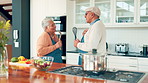 Old couple, singing and fun in kitchen for cooking, karaoke and meal prep or bonding together. Smile, elderly people and whisk with playful romance, healthy food and retirement celebration in house
