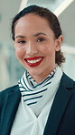 Happy woman, face and airport with flight attendant for travel service, commute or business class. Portrait, female person or gate agent with smile for airline safety, boarding assistance or guidance