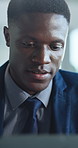 Finance, business and black man on laptop in office for investment report, online proposal and research. Professional, corporate and person busy on computer for financial review, website and planning