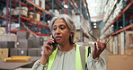 Warehouse, phone call or mature woman with stress, transportation delay or supply chain disruption. Glasses, inventory management or angry supervisor with mobile for export, shipping problem or talk