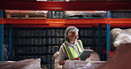 Supply chain, dancing and happy woman in warehouse, tablet and export with success. Mature person, excited and employee in workplace, achievement and celebration with logistics, import goals or smile