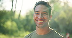 Face, hiking and man outdoor with smile for travel adventure, tourist exploration and start workout. Bokeh, happy person and wellness in nature with holiday activity, fitness and ready for exercise.