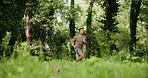 Nature, sports and man running in forest in morning for workout, training or wellness outdoor. Runner, health and male athlete with cardio exercise or jog in woods for active, fitness or challenge.