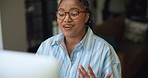 Woman, video call and online meeting with computer for virtual discussion or chat in home. Female person, remote work or freelancer talking with glasses for conversation or communication in house