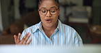 Woman, video call and online meeting with computer in home for virtual discussion or chat. Female person, remote work or freelancer talking with glasses for conversation or communication in house