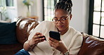Credit card, smartphone and black woman on sofa for online shopping, internet payment and purchase. Happy, home and person with phone on banking app for ecommerce, web store and digital discount