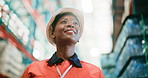 Below, black woman and thinking for logistics at warehouse with cargo, inspection and supply chain. Smile, female person and ideas for inventory management, quality control and distribution industry