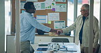 Teamwork, shaking hands and business people with graphs for budget, finance review and revenue meeting. Handshake, mentor and project management with statistics, charts or strategy for expense report