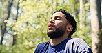Man, fitness and stretching with breathing in forest for workout preparation, break or rest. Calm, male person or getting ready with shoulder warm up for relaxed muscles or outdoor exercise in nature