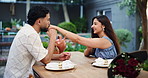 Holding hands, kiss, date and talking with couple in restaurant for valentines day, roses and romance. Anniversary celebration, flower bouquet and gift with man and woman for love, care and marriage