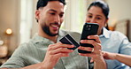 Hands, phone and couple with credit card for online shopping, internet banking or laugh. Mobile, woman and man with digital money for investment, financial payment or comedy subscription in home