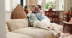 Peace sign, happy couple and selfie in home for love, social media update or funny memory on sofa. Smile, man and woman with photo in lounge for romantic relationship, laugh and relax with partner