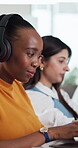 Headphones, woman or typing in office with laptop for music, journalism or news report research. Person, audio tech or coworking with computer for streaming song, editing article or story development