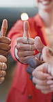 Thumbs up, team and hands of business people in office together for agreement, support and feedback. Startup, collaboration and workers with emoji for partnership, yes sign and approval in meeting