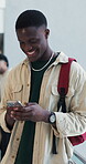 Student, man and laugh with phone at college for funny education chat, campus meme and study break. Learning, people and happy with smartphone at university for comic video or scholarship opportunity