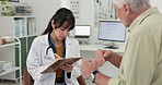 Clipboard, consulting and doctor with senior man for checkup, appointment and diagnosis. Healthcare, writing and mature patient and woman for wellness, medical service and explain symptoms in clinic