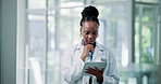 Thinking, doctor and black woman in clinic, tablet and typing with communication, solution and healthcare. Person, medical service and professional in hallway, choice or research with problem solving