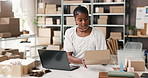 Supply chain, box and black woman on laptop for online orders, distribution and logistics. Small business, invoice and person on computer for shipping label, delivery info and inventory on website